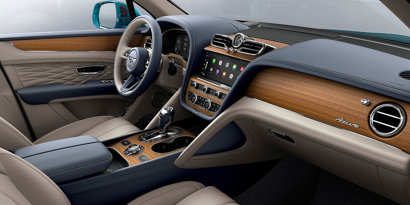 宾利东莞 Bentley Bentayga EWB Azure interior with Open Pore Koa veneer, view from the passenger seat over looking the driver's seat. 